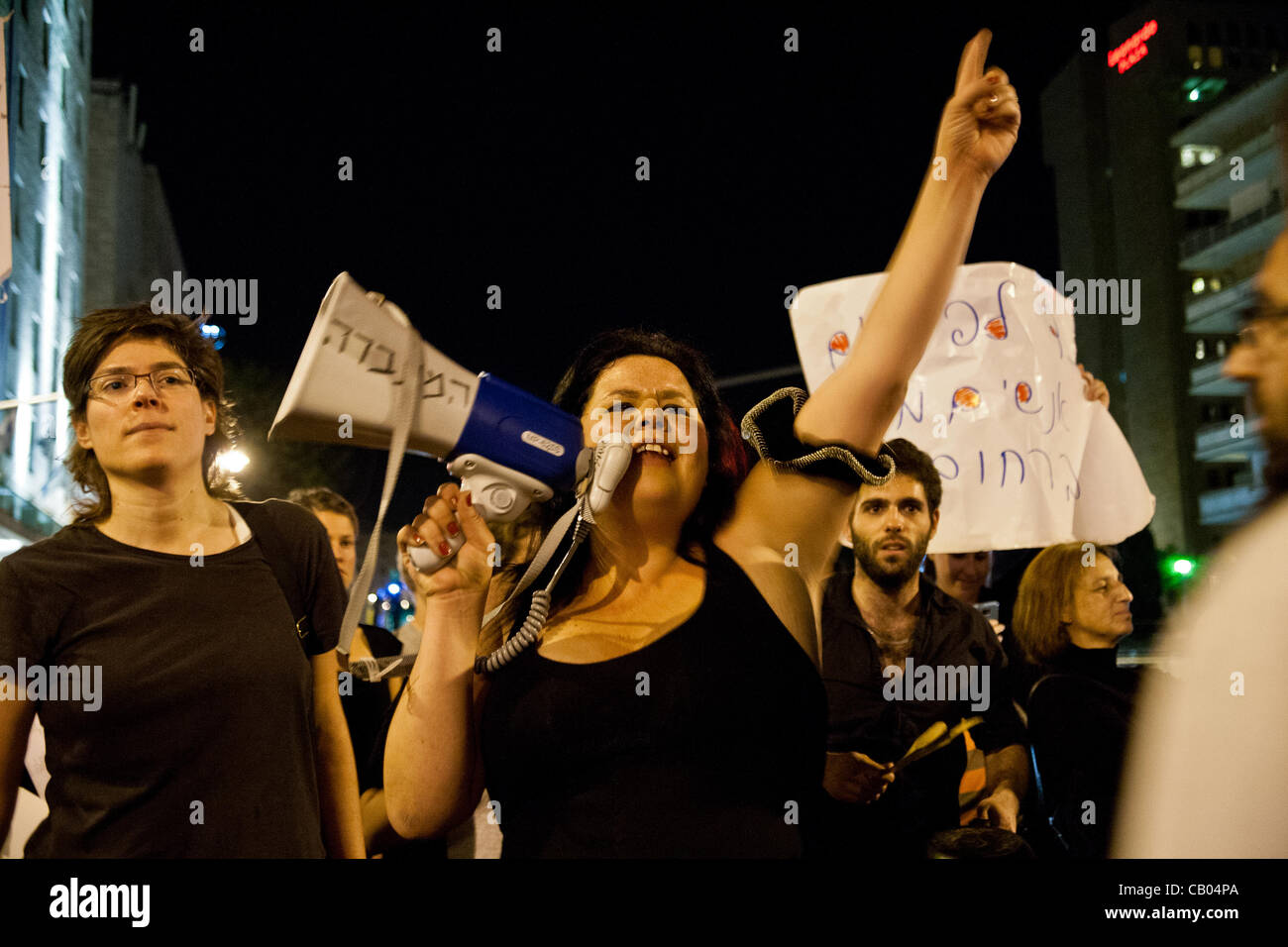 Protesters sing to the tune of a Hebrew children’s song “My Bibi has three homes…” referring to PM’s three apartments whereas many low class citizens struggle financially to maintain just one home or have no home at all. Jerusalem, Israel. 12-May-2012. Stock Photo