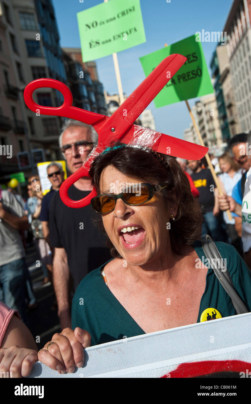 Barcelona, May 12, 2012. Thousands of people from the movement ' indignados' manifest themselves through the streets of downtown Barcelona to denounce the unjust economic policy of government in a show of force a year after his birth. The protests will continue until May 15, the anniversary of the Stock Photo