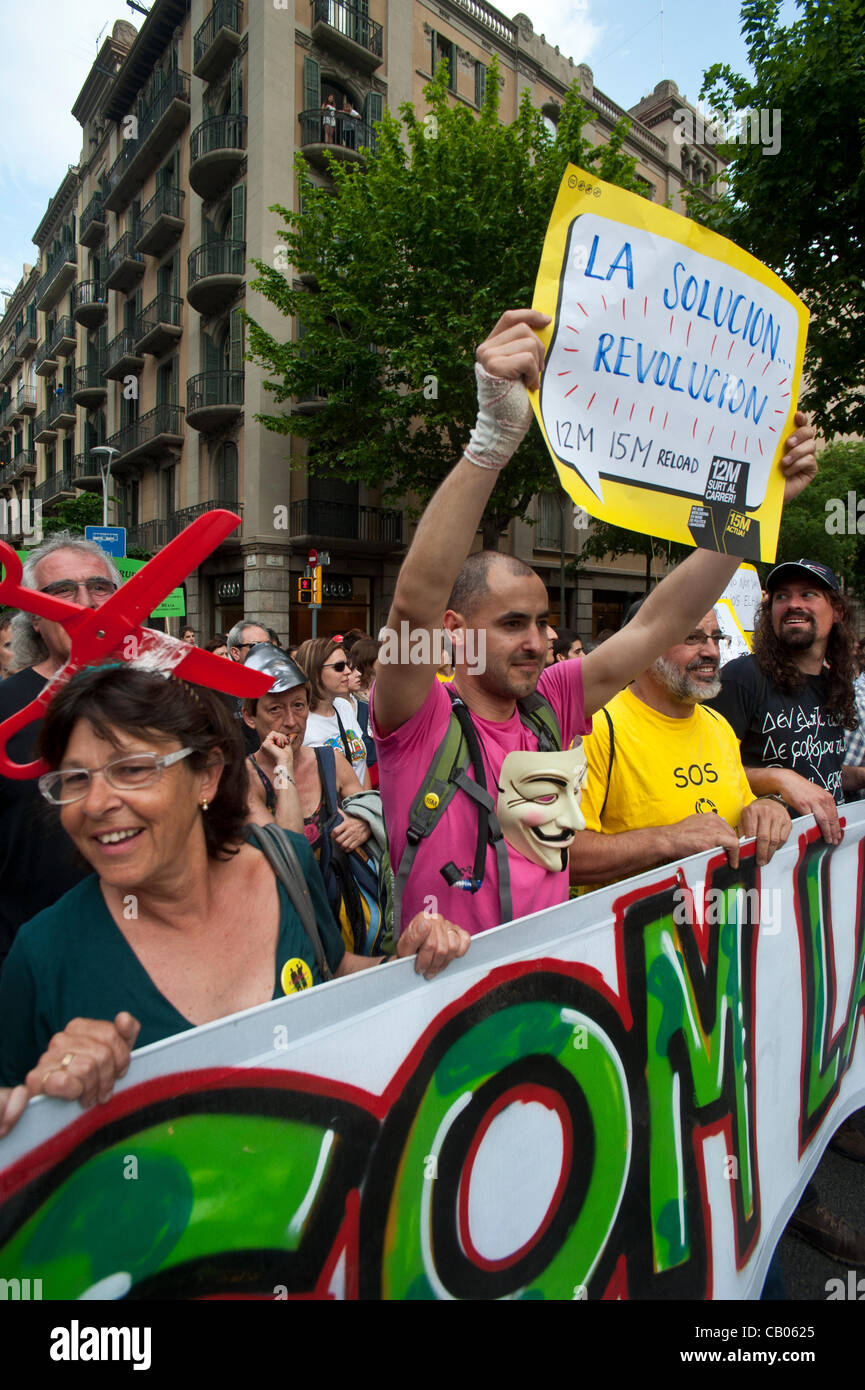 Barcelona, May 12, 2012. Thousands of people from the movement indignados manifest themselves through the streets of downtown Barcelona to denounce the unjust economic policy of government in a show of force a year after his birth. The protests will continue until May 15, the anniversary of the Stock Photo