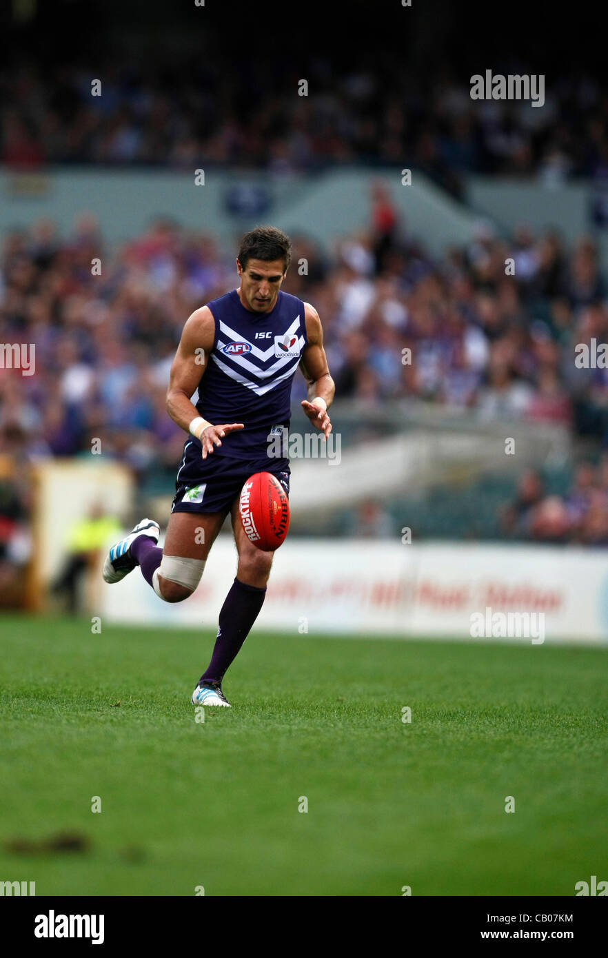 13.05.2012 Subiaco, Australia. Fremantle v Port Adelaide. Matthew Pavlich goes for a run with the ball during the Round 7 game played at Patersons Stadium. Stock Photo