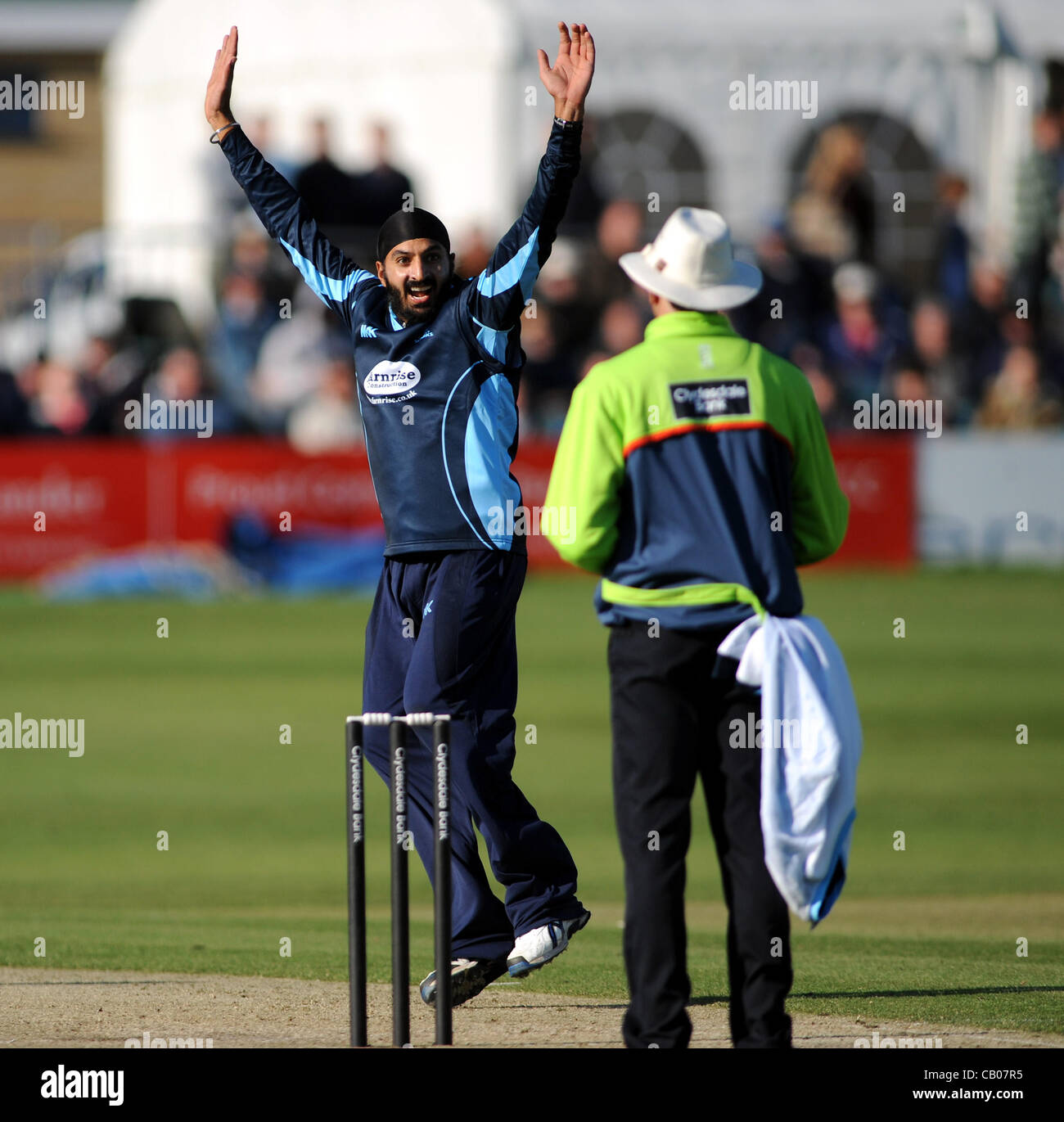 Sussex Sharks bowler Monty Panesar claims the wicket of Unicorns Tom New in their Clydesdale Bank 40 League cricket match at the Probiz County Ground in Hove today UK Photograph taken 13 May 2012 Stock Photo