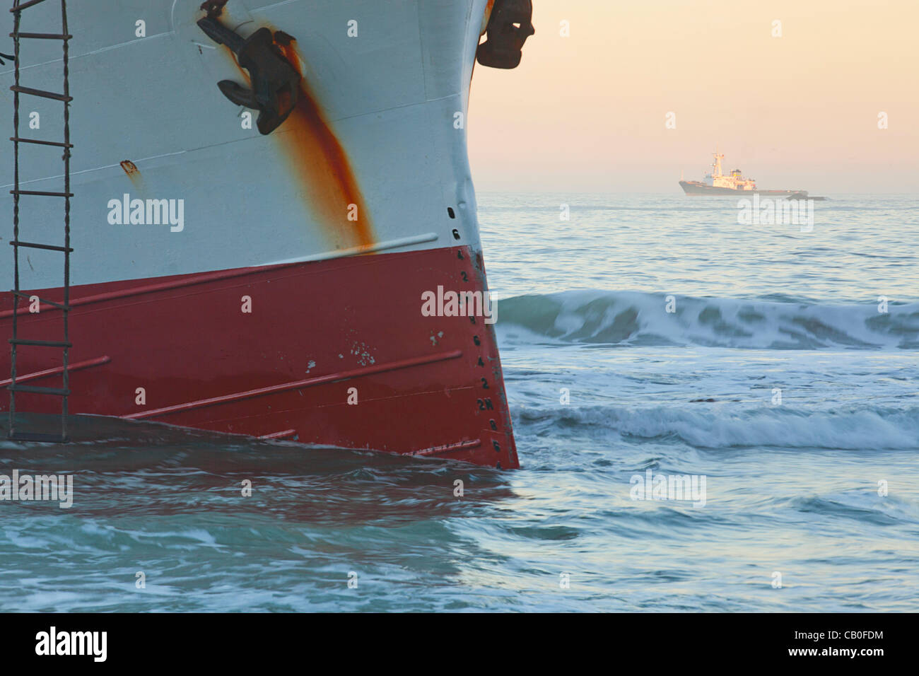 Stricken Japanese fishing boat "Eihatsu Maru" runs aground in Clifton