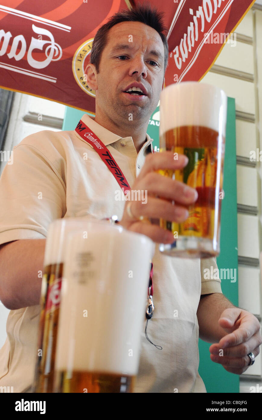Czech soccer player Pavel Horvath tap beer in Pilsen on May 15, 2012. (CTK Photo/Petr Eret) Stock Photo