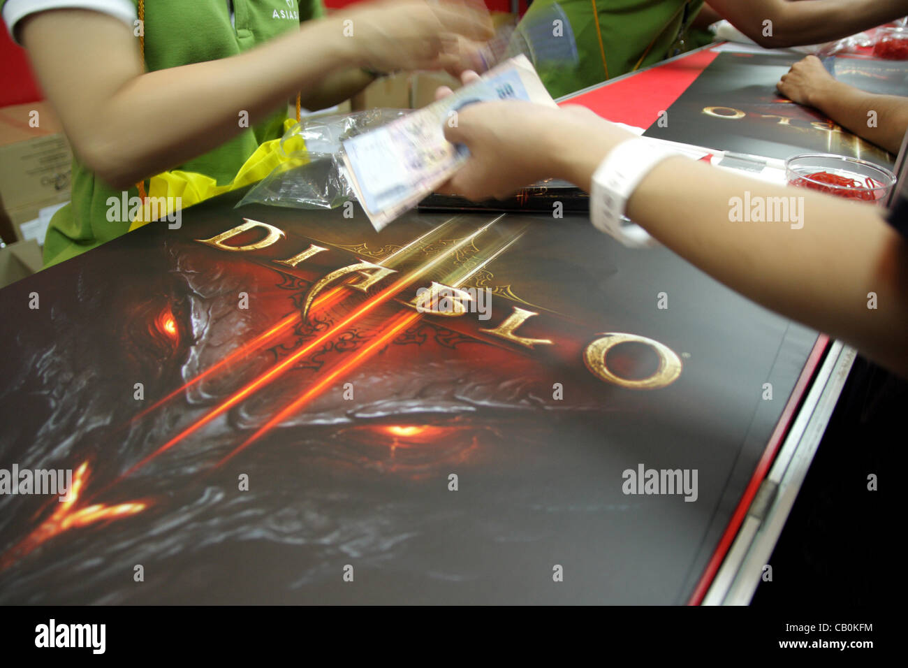 May 15, 2012, Siam Paragon , Bangkok , Thailand . Thousand of gamers buying ' Diablo 3' , an action role-playing game by Blizzard Entertainment after waiting for 12 year . Stock Photo