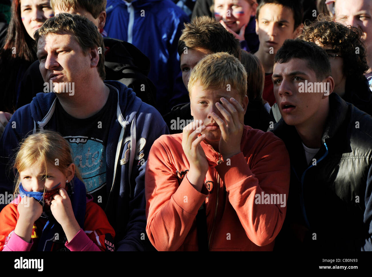 Fans of Viktoria Plzen dejected at the couryard of Pilsner Urquell in Pilsen after the decisive match of the 30th round of the Czech soccer league Slovan Liberec vs Viktoria Plzen on May 12, 2012. Slovan Liberec won the titel, Viktoria Plzen is third after the match finished 0:0. (CTK Photo/Petr Ere Stock Photo