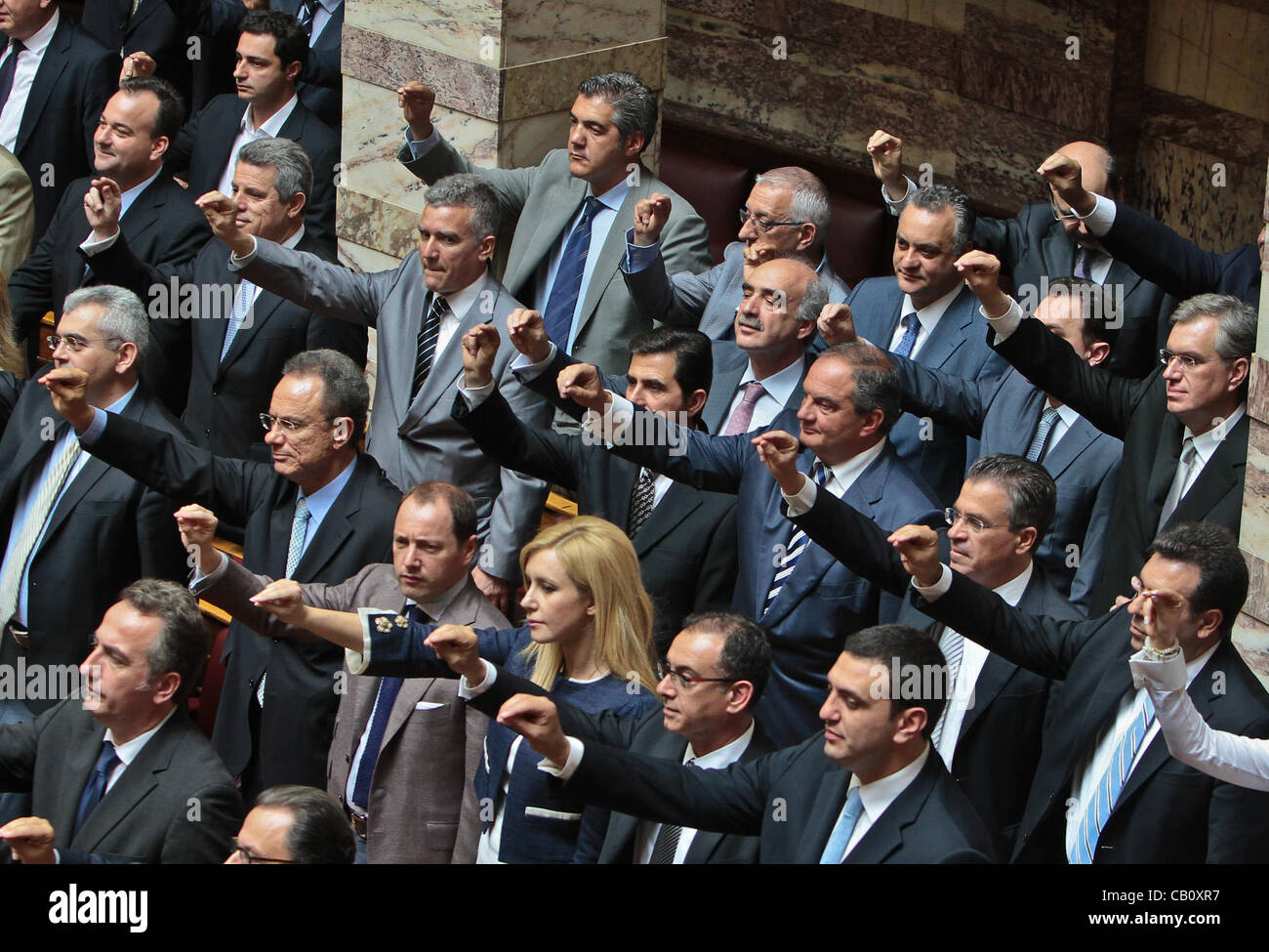 May 17, 2012 - Athens, Greece - Kostas Karamanlis, former conservative leader of New Democracy, stands among his collegues and takes the oath of office. Party leaders and members of the Greek Government take the oath of office inside the Greek Parliament, Syndagma, May 17, 2012 to the form a tempora Stock Photo