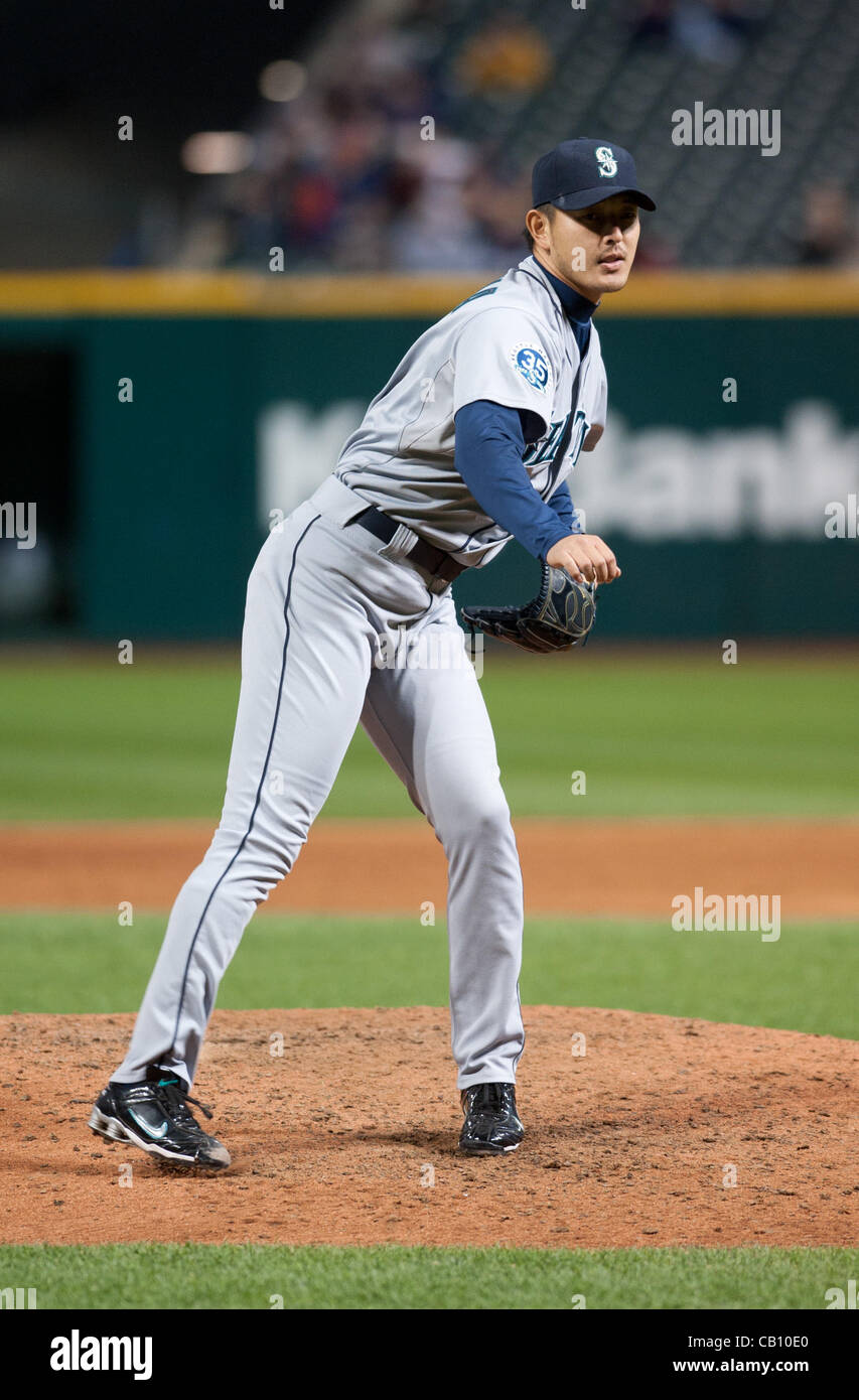CLEVELAND, OH USA - MAY 16:  Seattle Mariners relief pitcher Hisashi Iwakuma (18) warns up during the sixth inning at Progressive Field in Cleveland, OH, USA on Wednesday, May 16, 2012. Stock Photo
