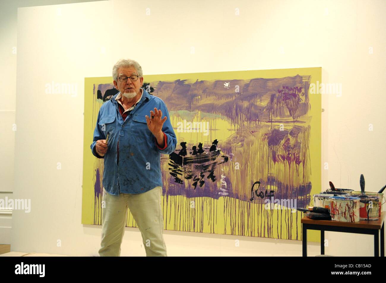 LIVERPOOL, UK, 18th May, 2012. Rolf Harris painting at the Walker Art