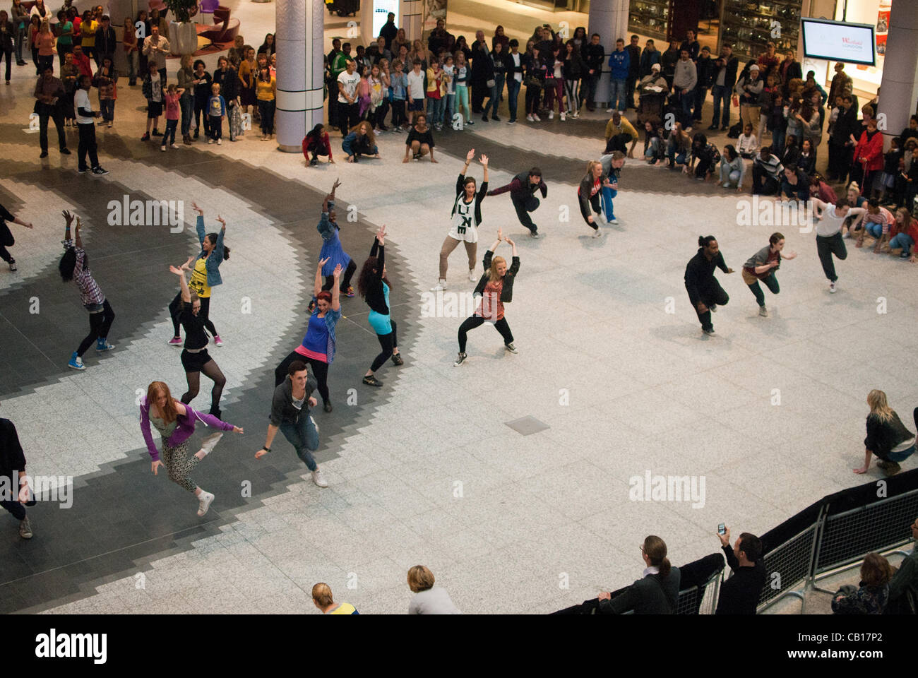 Big Dance doing Flashmob dancing in Westfield White City in London on 18/05/2012 Stock Photo
