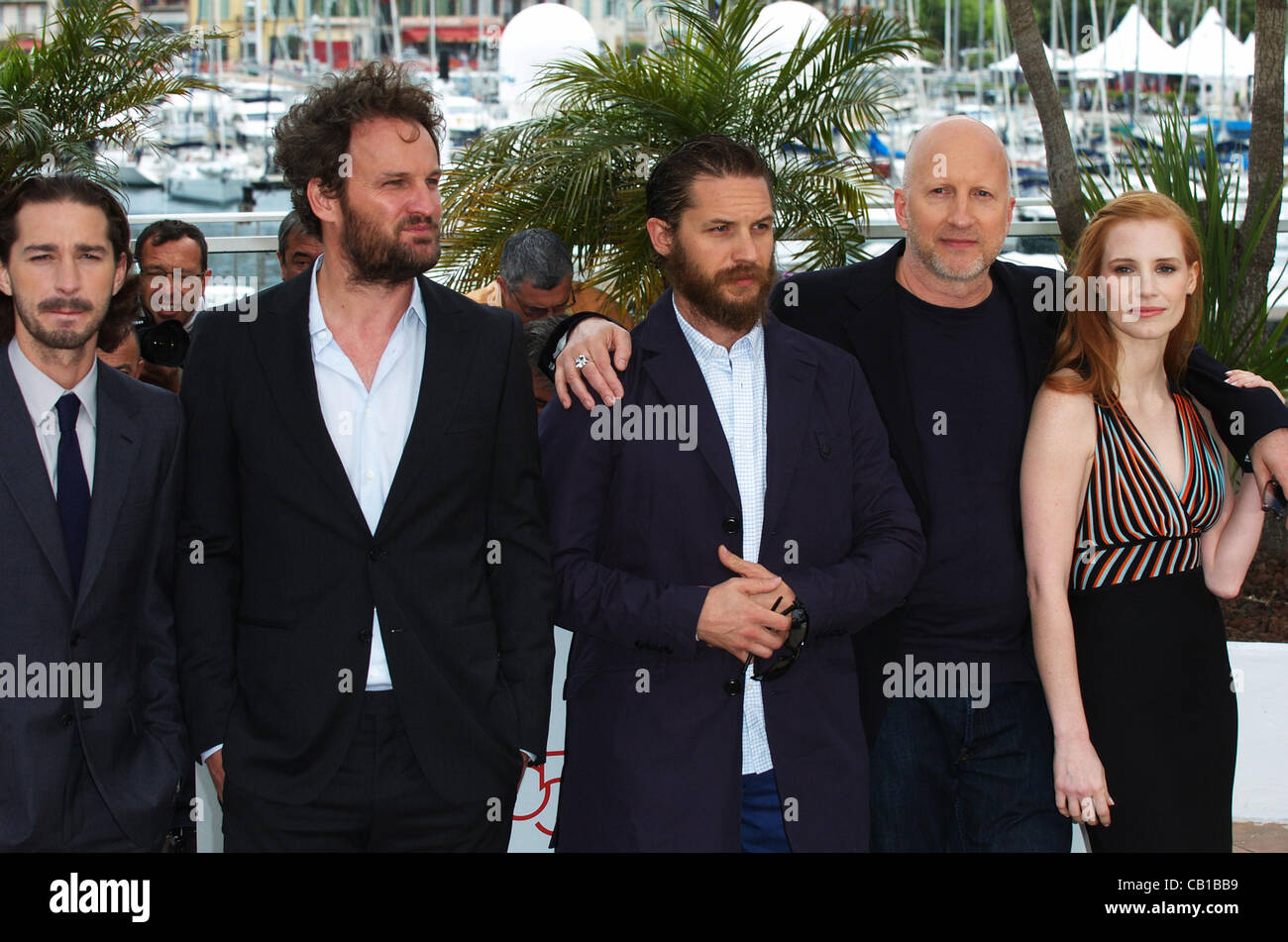 May 19, 2012 - Cannes, France - CANNES, FRANCE - MAY 19: (L-R) Actor Jason Clarke, screenwriter Nick Cave, actor Tom Hardy, director John Hillcoat, actress Jessica Chastain and actor Shia LaBeouf attend the 'Lawless' Photocall during the 65th Annual Cannes Film Festival at Palais des Festivals on Ma Stock Photo