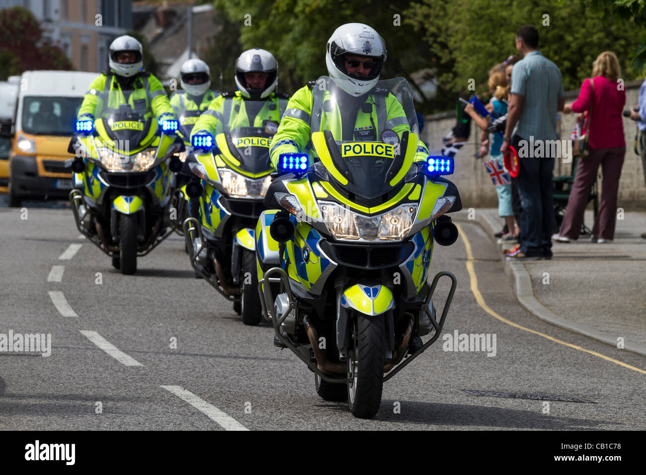 Falmouth, UK. 19 May, 2012. Part of the police escort for the torch bearers Stock Photo