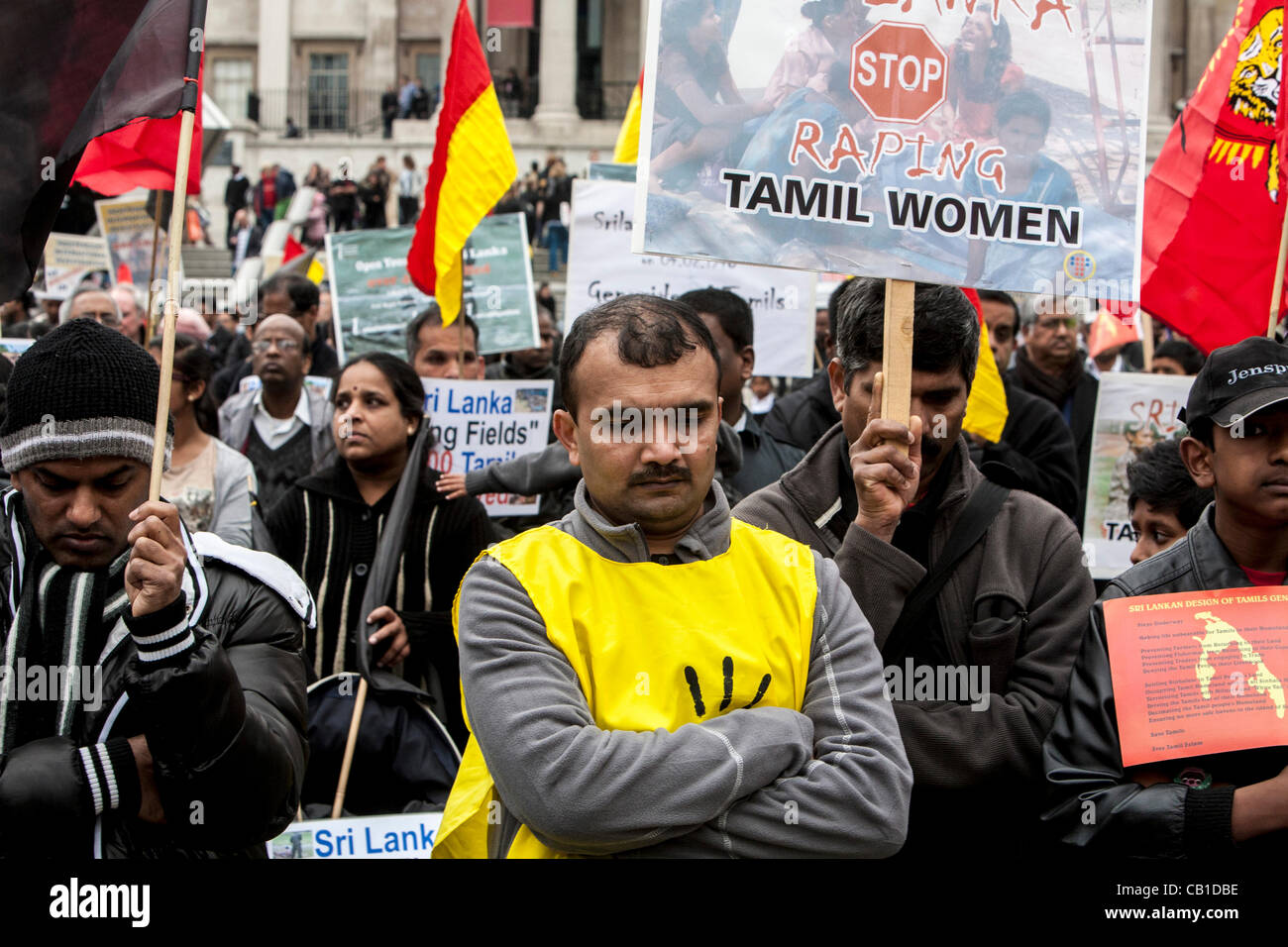 London, United Kingdom, 19/05/2012. Tamil protesters holding a minute silence during a rally where Tamils are demanding justice for the many people were killed in alleged war crimes during the civil war in 2009 Stock Photo