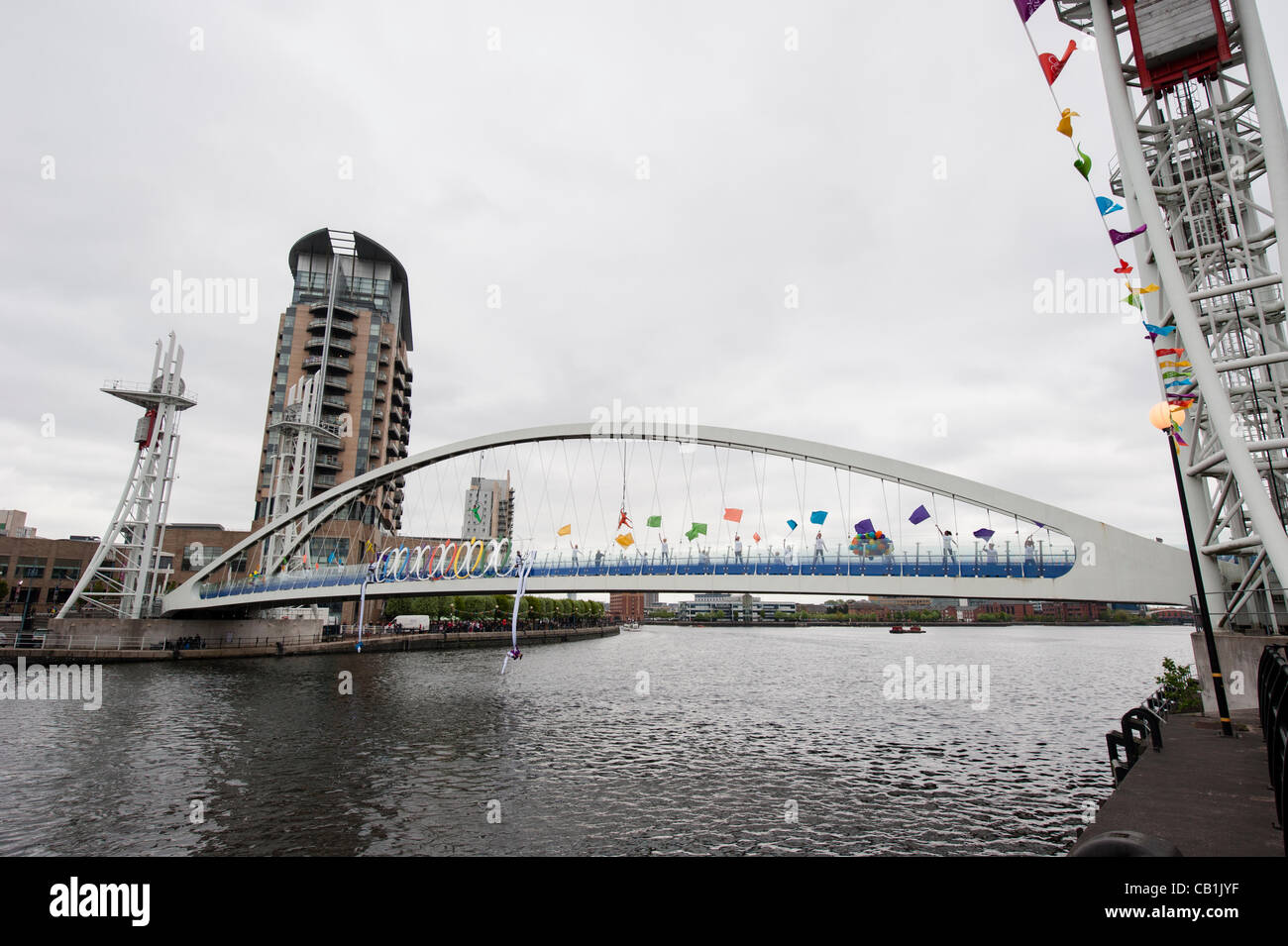 Manchester welcomes the Olympic Torch to the UK and signals the start of events in the North West at Salford Quays, 19th May, 2012. Stock Photo