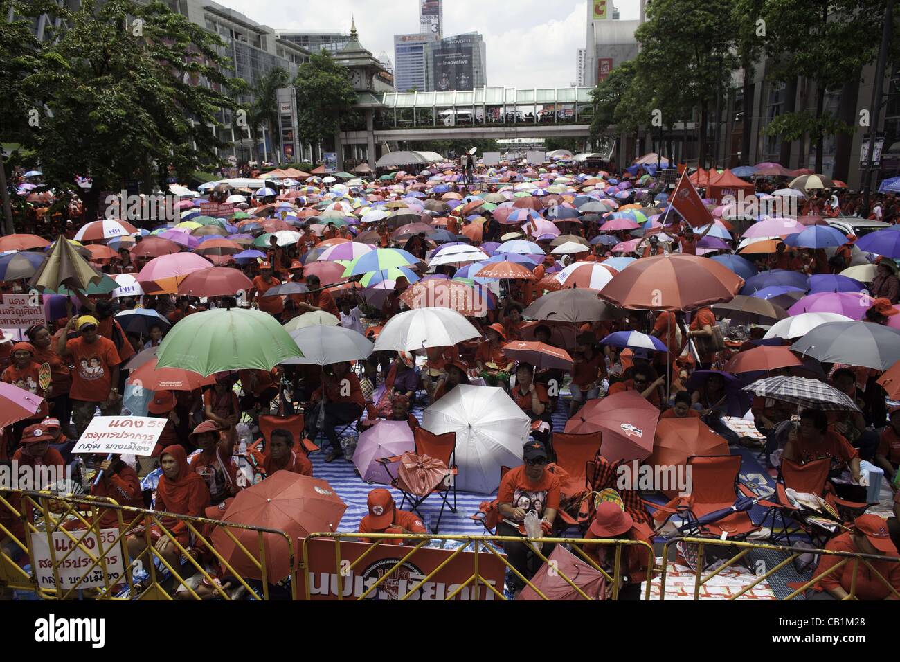 May 19, 2012 - Bangkok, Thailand - Thai Government supporters, known as ''Red Shirts'' gather on the streets of Bangkok outside the World Trade Center  during a rally Saturday, May 19, 2012 to remember those killed by Thai security forces two years earlier.  At least 92 people were killed during the Stock Photo
