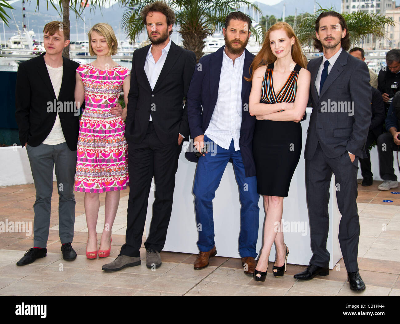 L-R: Dane Dehaan (actor), Mia Wasikowska (actress), Jason Clarke (actor), Tom Hardy (actor), Jessica Chastain (actress), Shia Labeouf (actor) at photocall for film 'Lawless' 65th Cannes Film Festival 2012 Palais des Festival, Cannes, France Sat 19th May 2012 Stock Photo
