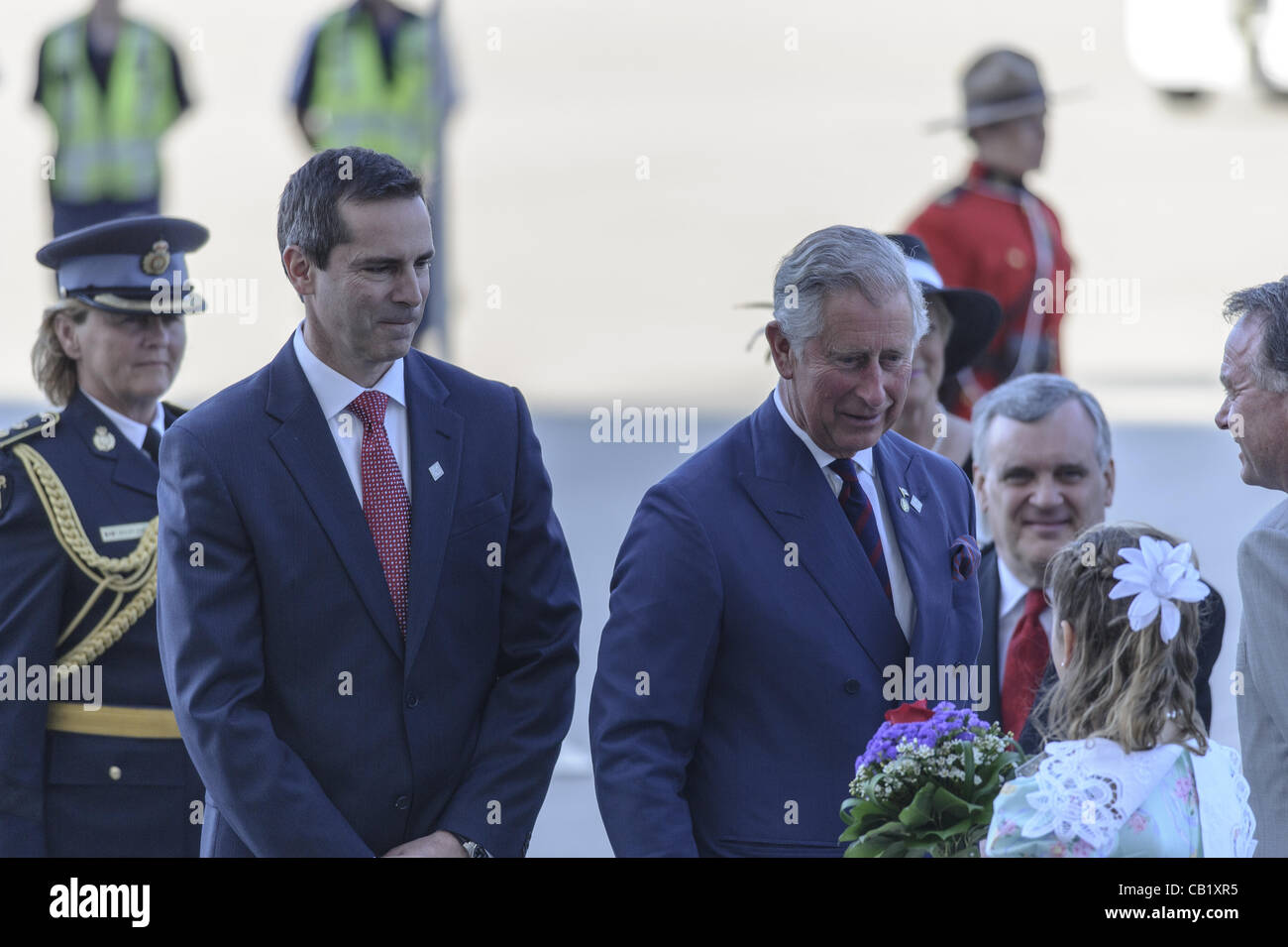 May 21, 2012 - Toronto, Ontario, Canada - PRINCE CHARLES and his wife CAMILLA, Duchess of Cornwall have kicked off the Ontario leg of their Canadian tour. In picture - Ontratio Premier DALTON MCGUINTY, PRINCE CHARLES, Ontario Lieutenant Governor DAVID ONLEY, MORGAN MARIE FREMLIN. (Credit Image: © Ig Stock Photo