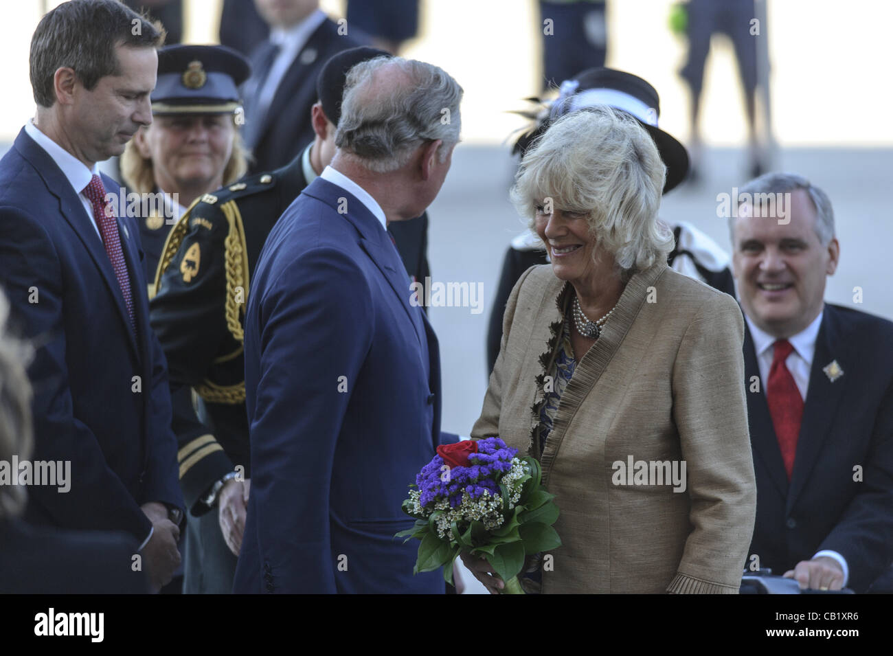 May 21, 2012 - Toronto, Ontario, Canada - PRINCE CHARLES and his wife CAMILLA, Duchess of Cornwall have kicked off the Ontario leg of their Canadian tour. In picture - Ontratio Premier DALTON MCGUINTY, PRINCE CHARLES, The Duchess of Cornwall CAMILLA, Ontario Lieutenant Governor DAVID ONLEY (Credit I Stock Photo
