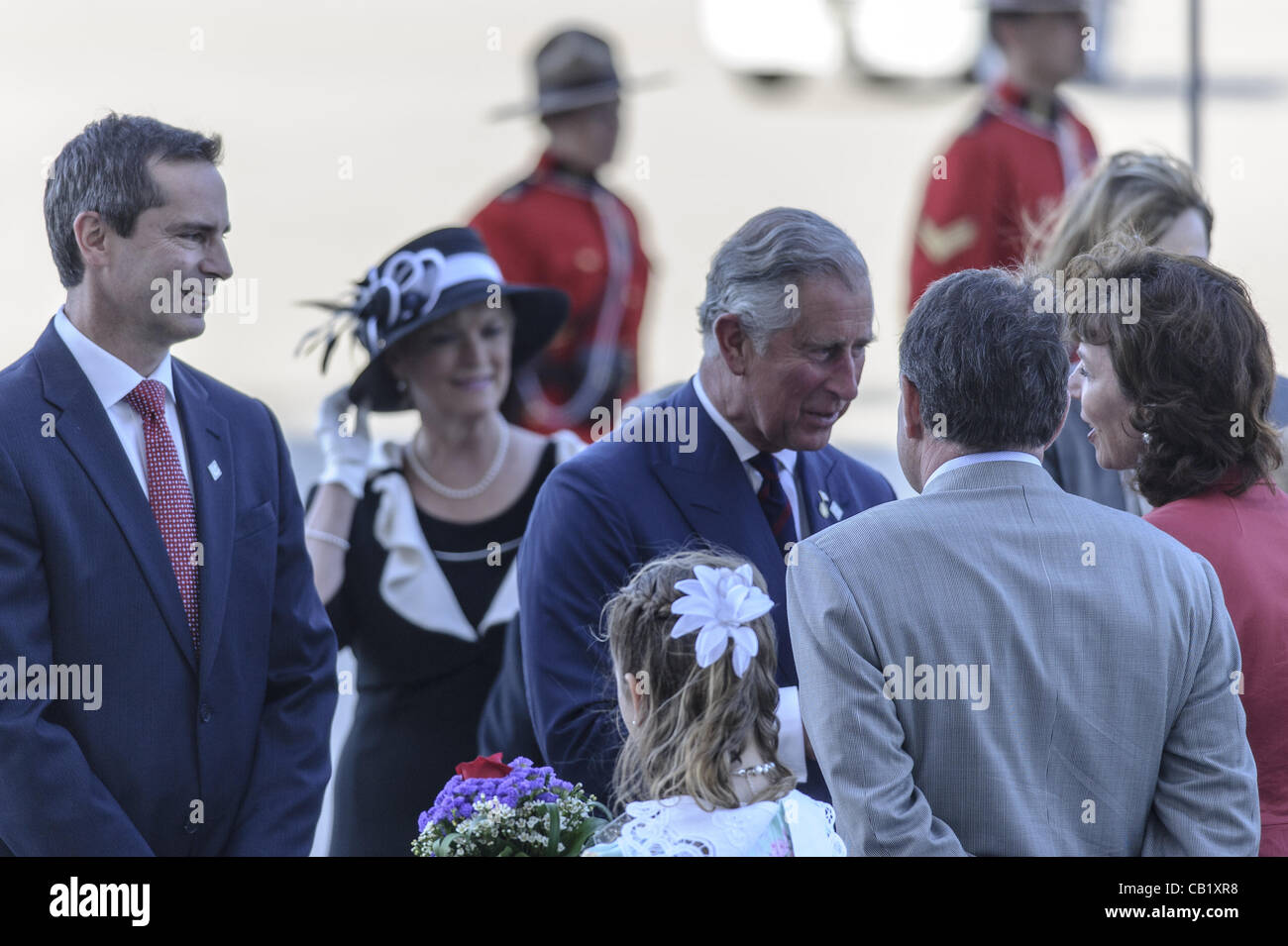 May 21, 2012 - Toronto, Ontario, Canada - PRINCE CHARLES and his wife CAMILLA, Duchess of Cornwall have kicked off the Ontario leg of their Canadian tour. In picture - Ontratio Premier DALTON MCGUINTY, PRINCE CHARLES, RUTH ANN ONLEY (Credit Image: © Igor Vidyashev/ZUMAPRESS.com) Stock Photo