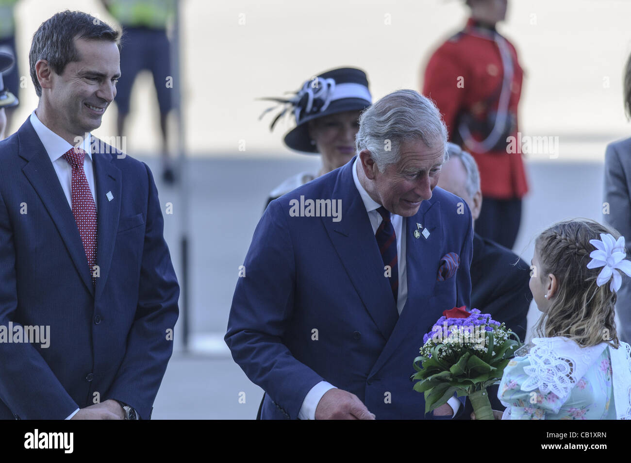 May 21, 2012 - Toronto, Ontario, Canada - PRINCE CHARLES and his wife CAMILLA, Duchess of Cornwall have kicked off the Ontario leg of their Canadian tour. In picture - Ontratio Premier DALTON MCGUINTY, PRINCE CHARLES, MORGAN MARIE FREMLIN. (Credit Image: © Igor Vidyashev/ZUMAPRESS.com) Stock Photo