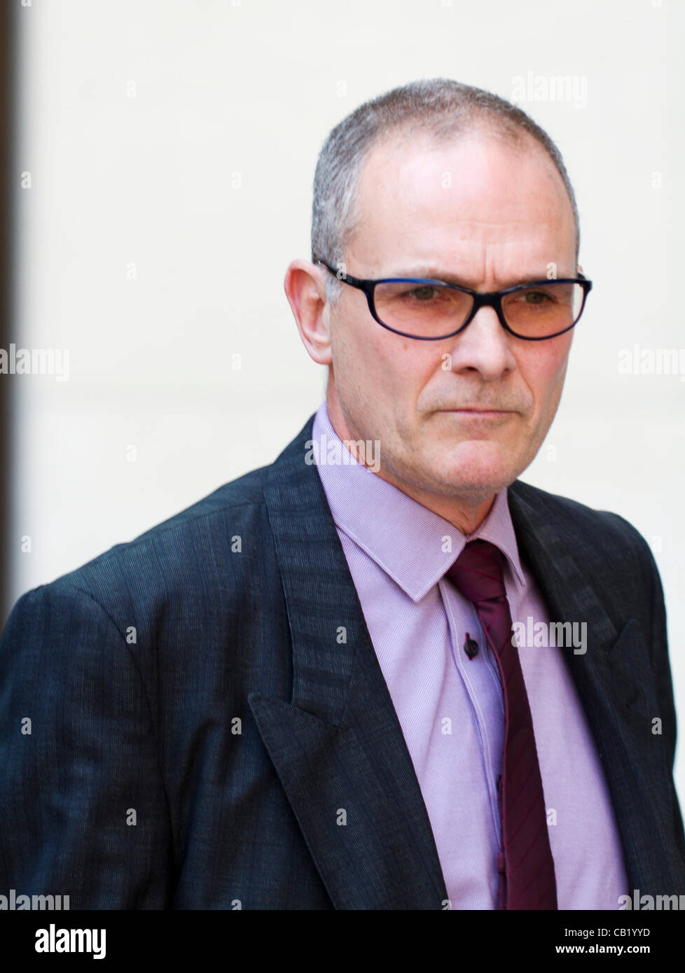 London, UK. 22nd May 2012. PC Alex MacFarlane leaves Westminster Magistrates Court, London. PC Alex MacFarlane allegedly racially abused a black man during last summer's riots.PLEASE NOTE NAME SPELLING HAS BEEN CORRECTED FROM PREVIOUS. Stock Photo