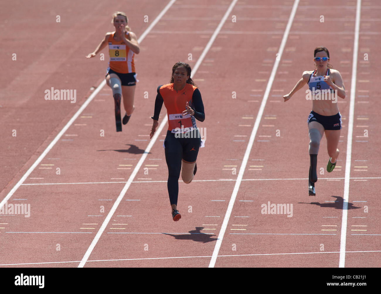 April Holmes (USA) (1) wins the 100m T42 T43  T44 Category in 13.46. Marlou van Rhyn (Netherlands) (5) 2nd in 13.58.Stephanie Reid (GB)(6) 3rd 14.07 in the Paralympic World Cup at Sportcity, Manchester UK  22-05-2012 Stock Photo