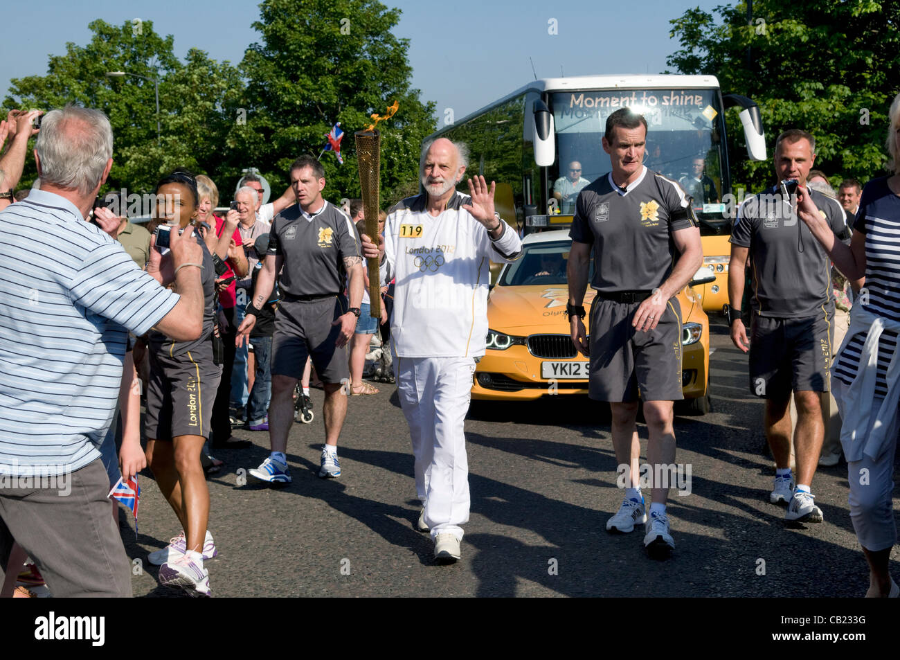Olympic torch relay team at Longwell Green, Bristol, UK.  22nd May 2012. Stock Photo