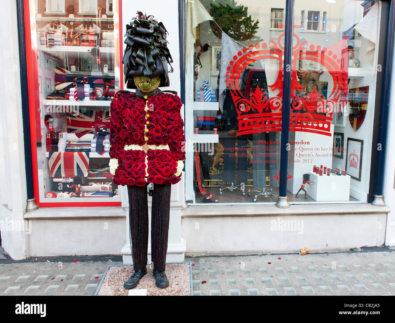 A flower Guardsman celebrates the Chelsea Flower Show outside the