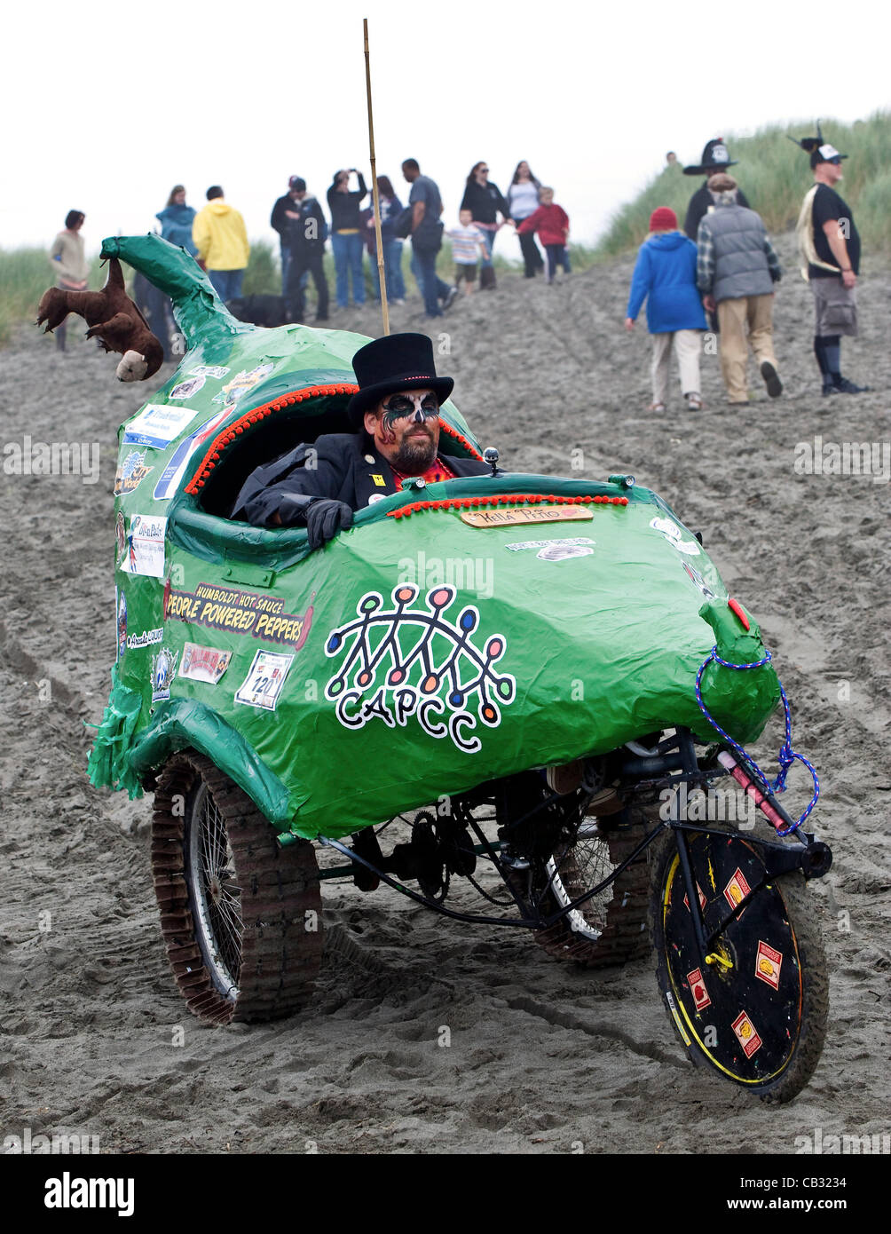 May 26, 2012 - Arcata, CA, USA -  The 'Humboldt's Hotsauce's Hella Peno' entry exits the sand dunes and starts down the beach on the first day of the 44th Annual Kinetic Grand Championship, a three-day, 42-mile bicycle race for all-terrain, human-powered art sculptures. Stock Photo