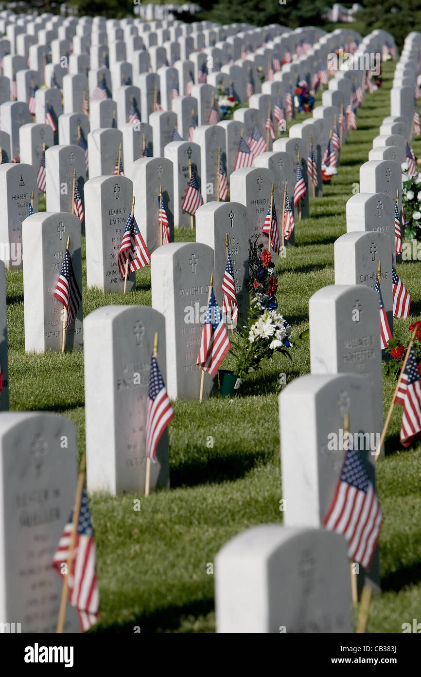 May 28, 2012 - Denver, CO, USA - Tombstones are decorated for Memorial Day services at Fort Logan National Cemetery on Monday morning in Denver Colorado. (Credit Image: © Hector Acevedo/ZUMAPRESS.com) Stock Photo