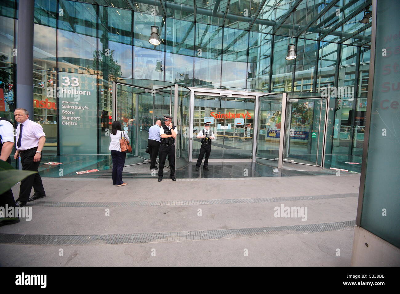 Monday 28th May 2012 Pay Up group target Sainsbury's head office as they call on the company to pay workers a living wage'. Credit Line : Credit:  HOT SHOTS / Alamy Live News Stock Photo