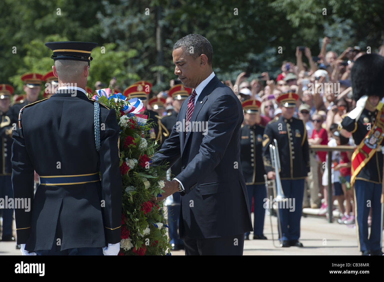 US President Barack Obama places a wreath at the Tomb of the Unknowns in honor of Memorial Day at Arlington National Cemetery May 28, 2012 in Arlington, VA Stock Photo