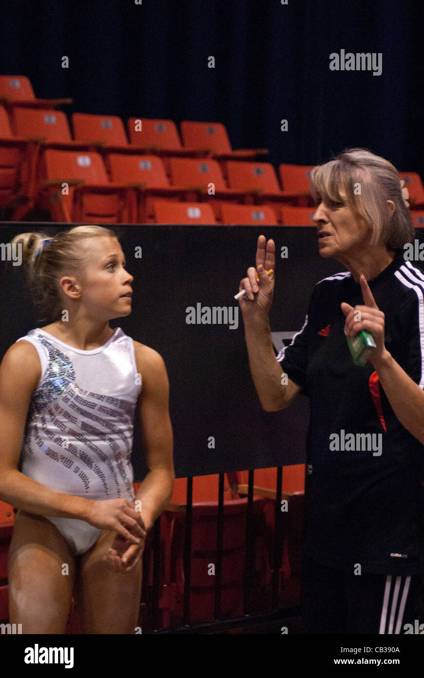 McKenzie Wofford gets tips from her coach during practice at the UIC  Pavillion in Chicago the day before their competition taking place May  26th. Some of the women will find a place