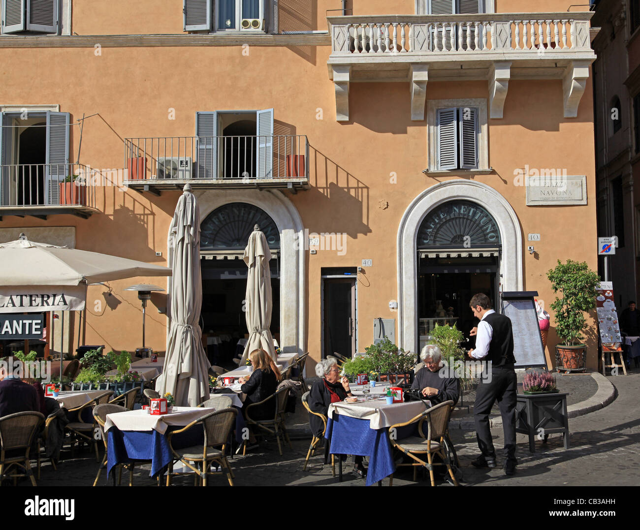 Rome, Piazza Navona, tables outside restaurant Stock Photo