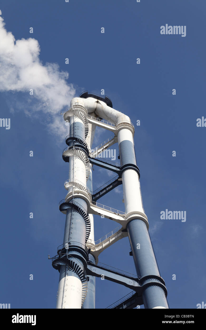 Industrial smokestack with smoke Stock Photo