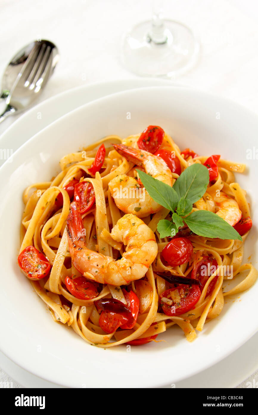 Pasta with tomato and prawn Stock Photo