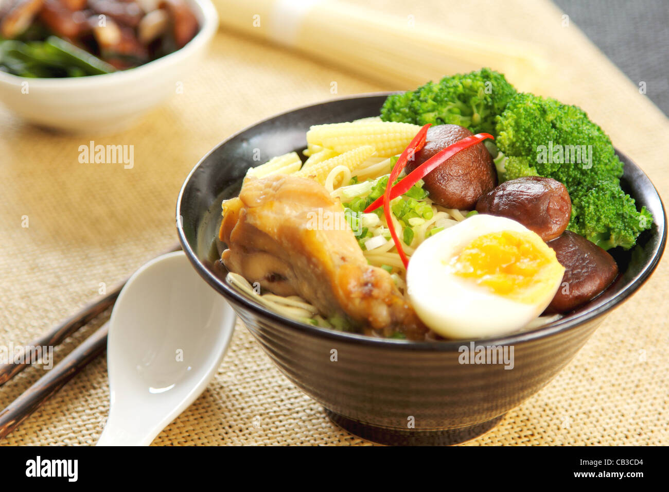 Noodle soup with mushroom and chicken Stock Photo