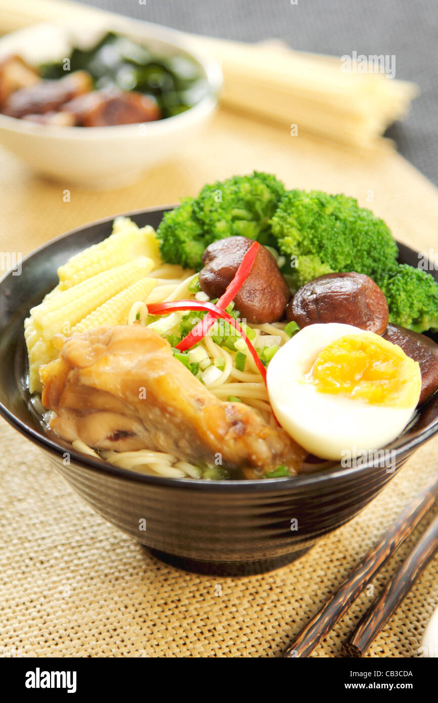 Noodle soup with mushroom and chicken Stock Photo
