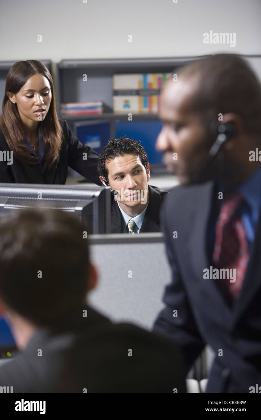 Close up of business people working in a busy office Stock Photo