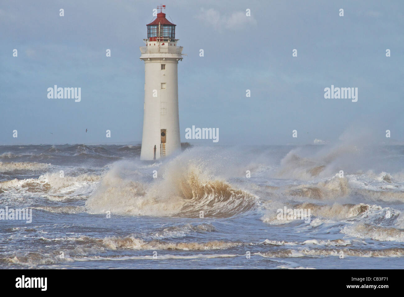 Perch Rock Lighthouse in high winds at high tide. New Brighton, England