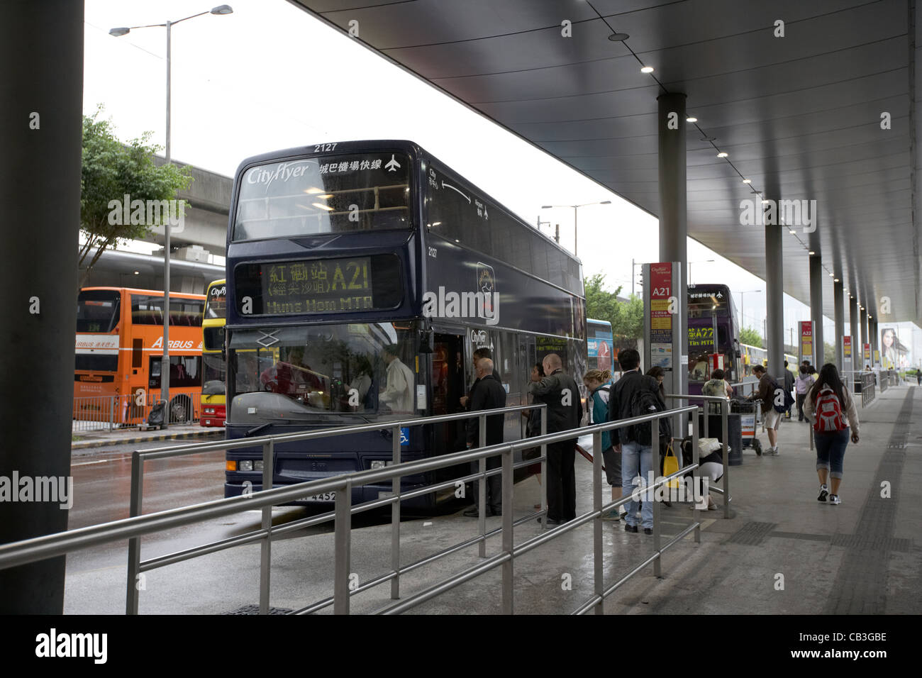 people queuing for airport bus at hong kong international airport, lantau island, hong kong, hksar, china Stock Photo