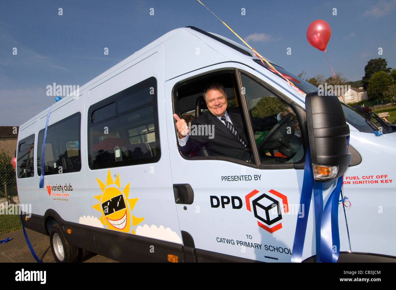 Welsh entertainer Max Boyce in the driving seat of a Sunshine Variety