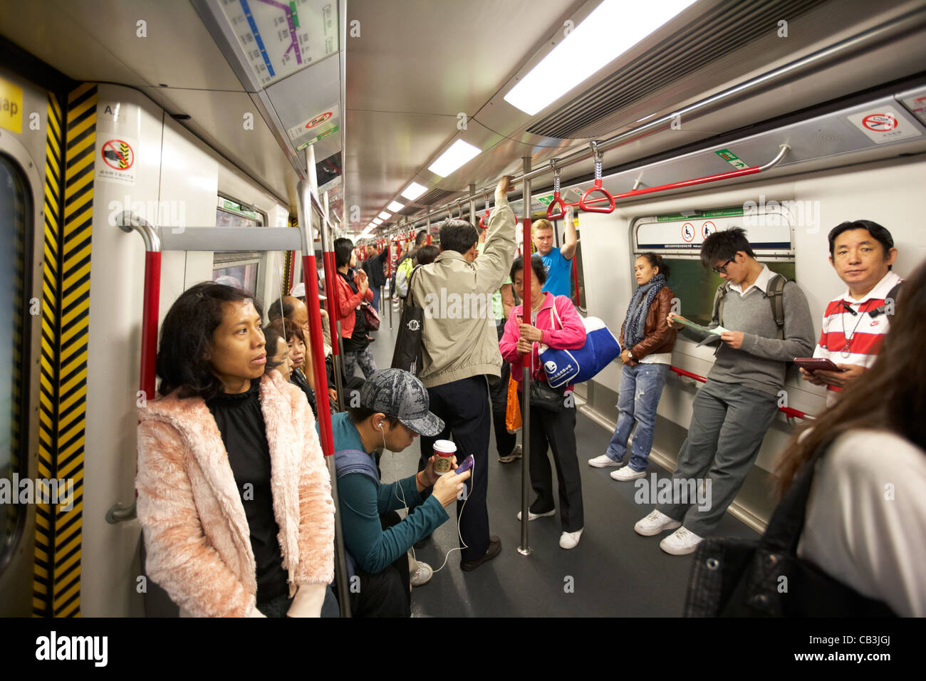 people on the mtr underground train in kowloon hong kong hksar china ...