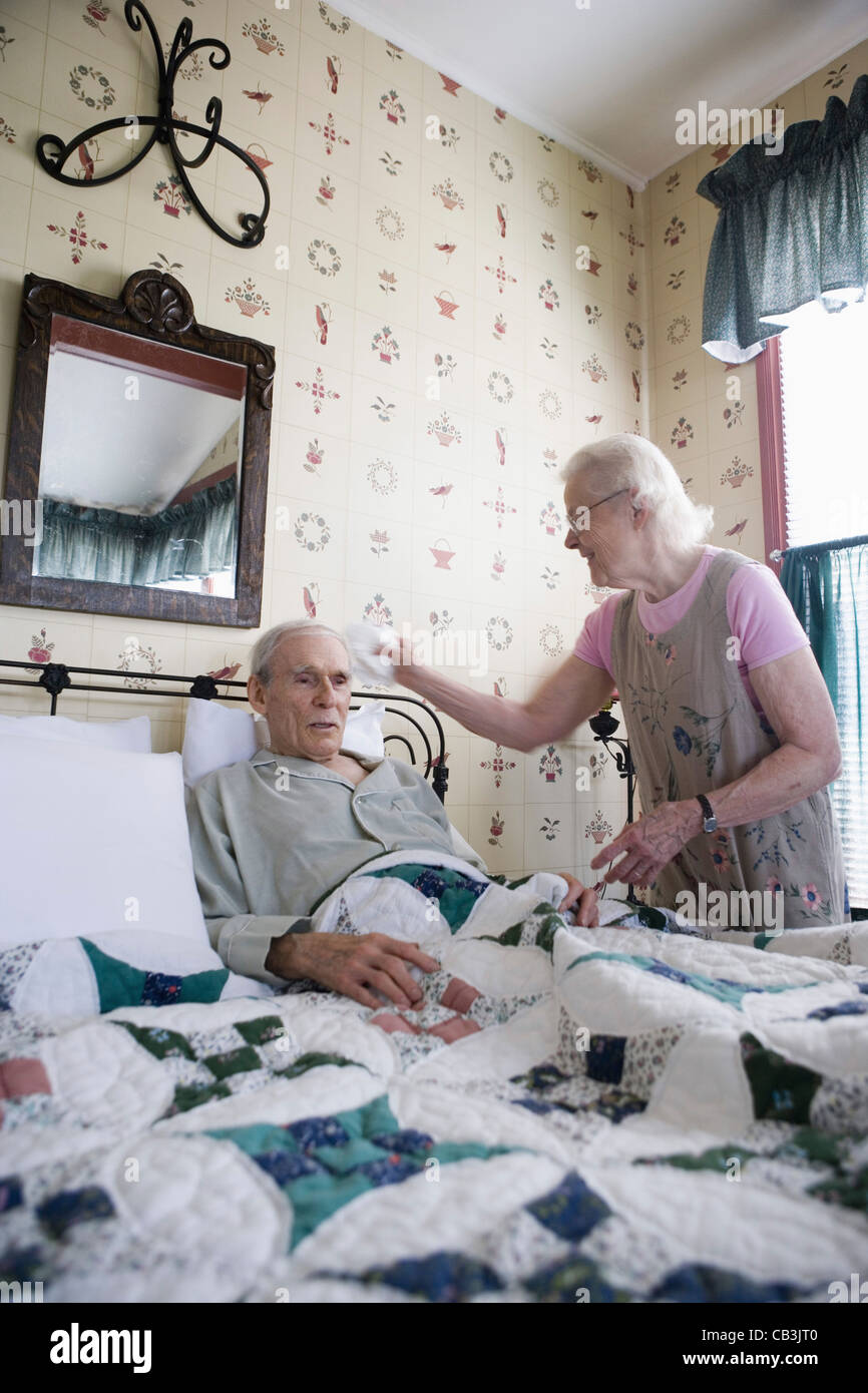 Bedridden elderly man hires stock photography and images Alamy