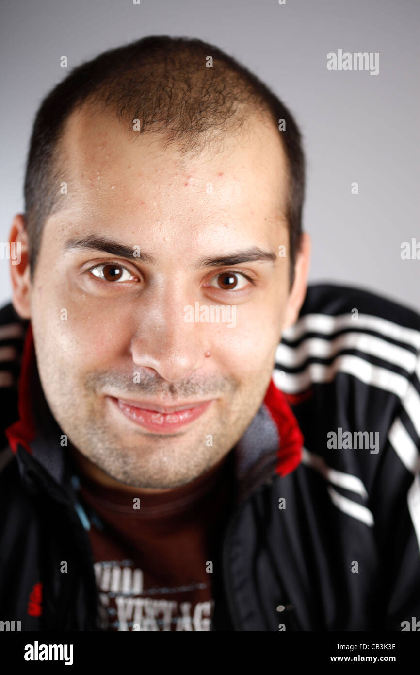 Close up photo of a young happy man Stock Photo - Alamy