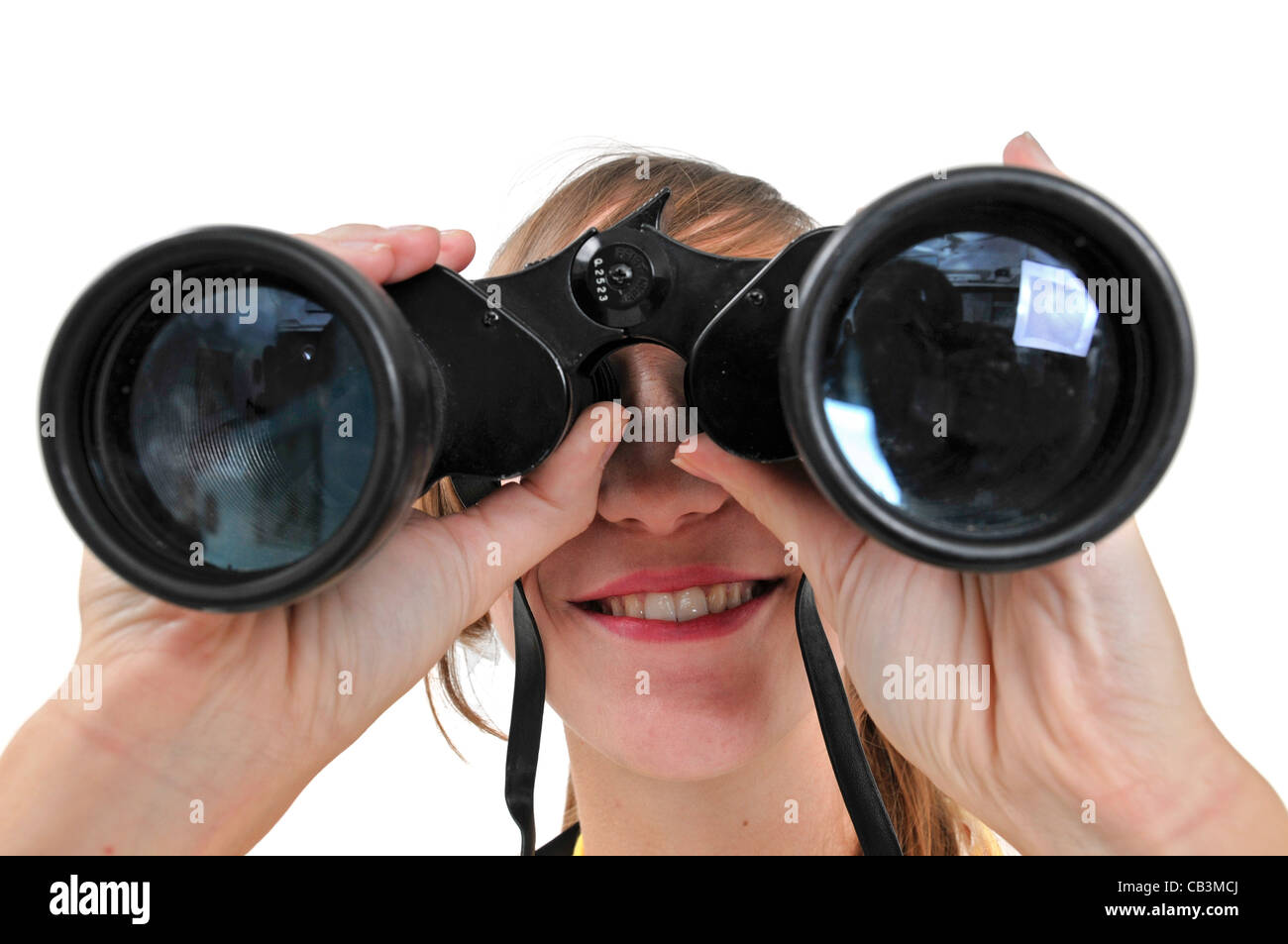 Young business woman looking at the future with binoculars On white Background Stock Photo