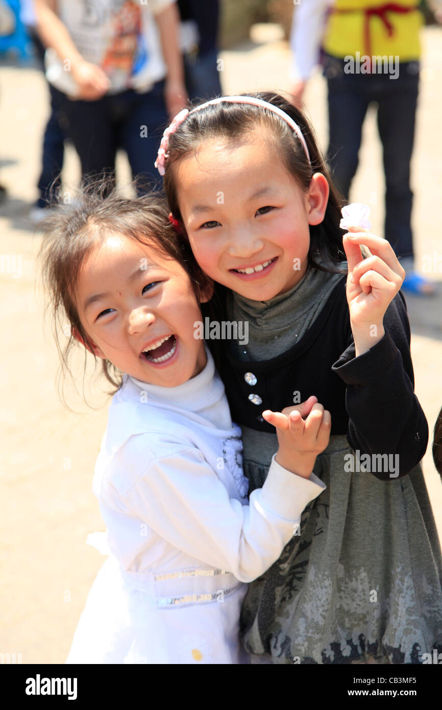 China, Kunming, Portrait of two girls Stock Photo - Alamy