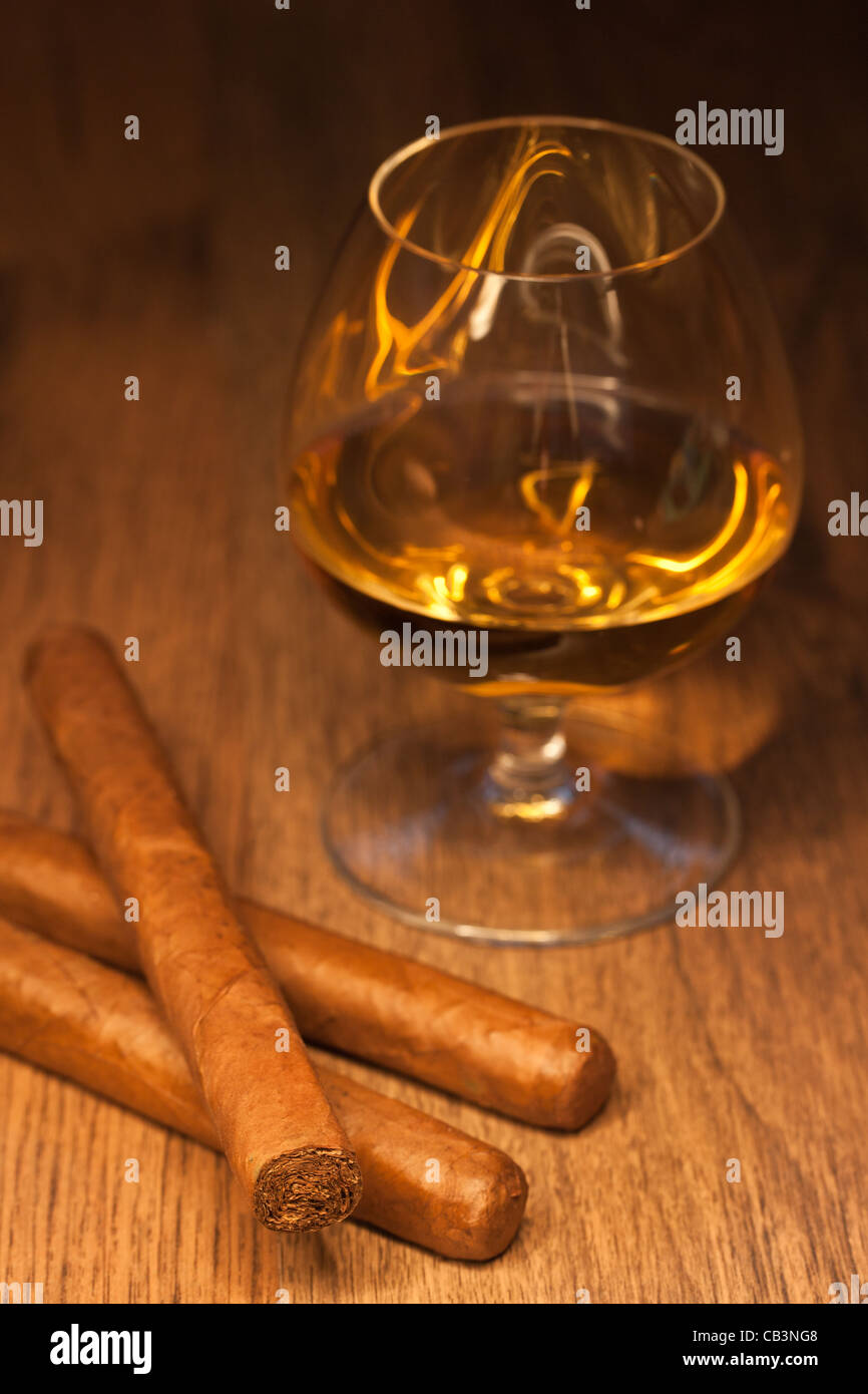 typical havana cigars with pure whisky drink background Stock Photo
