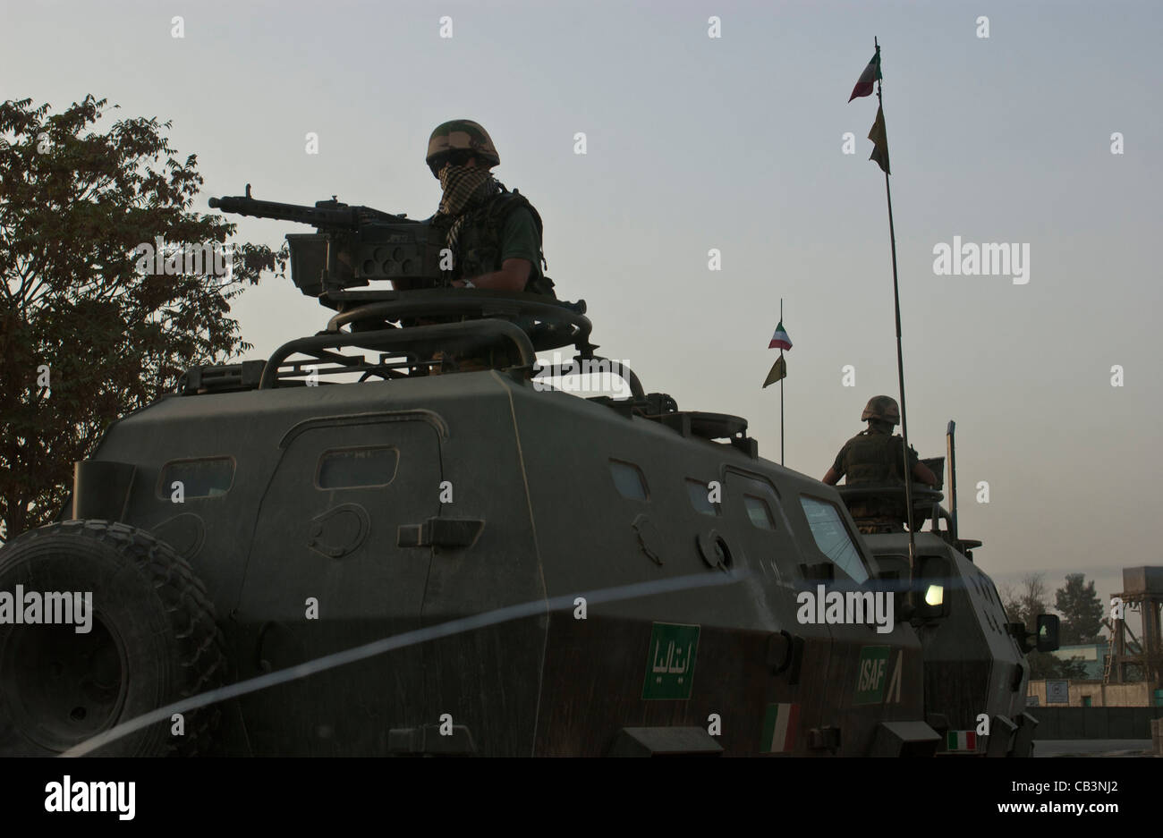 Italian ISAF soldiers in an armoured personnel carrier in Kabul, Afghanistan, October 2004 Stock Photo
