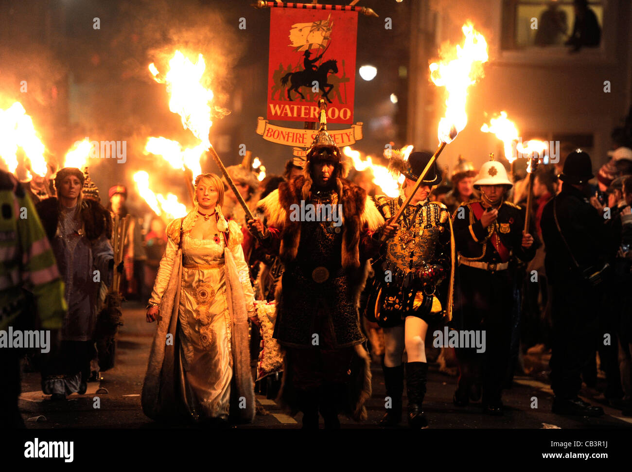 Procession in Lewes bonfire night celebrations showing Waterloo Bonfire ...