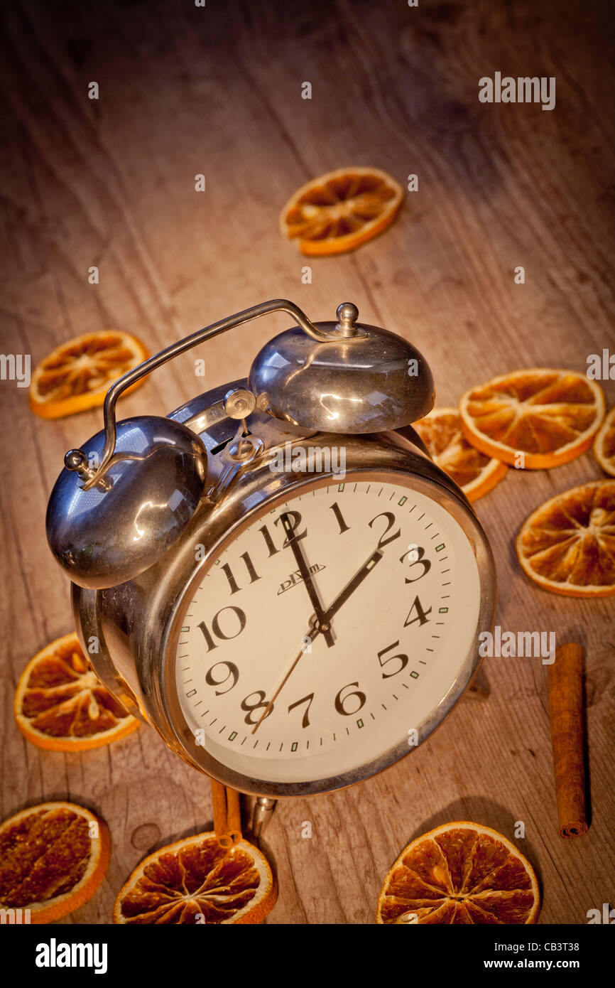 Old vintage metal alarm clock on wooden background Stock Photo Alamy